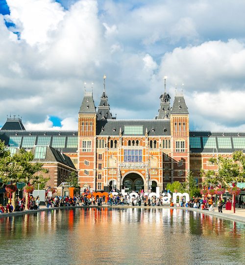 Rijksmuseum Amsterdam museum with words I Amsterdam in a summer day